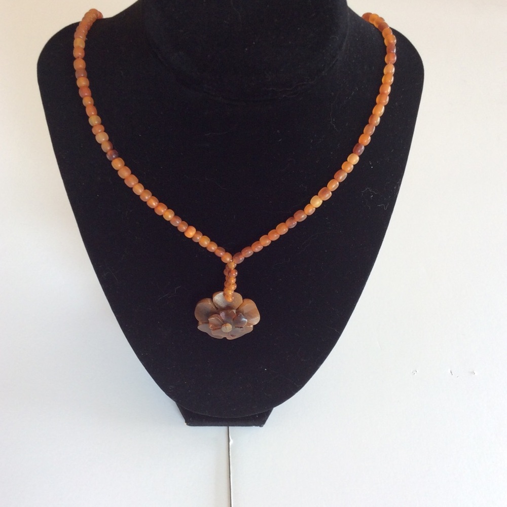 Unique caribou necklace made from Alaskan caribou hoofs.